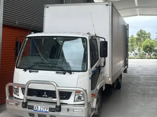 Safepack removal truck parked under a carport ready for a Gold Coast move