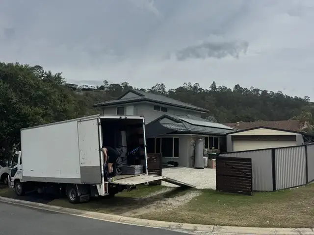 Safepack Removals truck parked outside a Gold Coast home ready for a house move